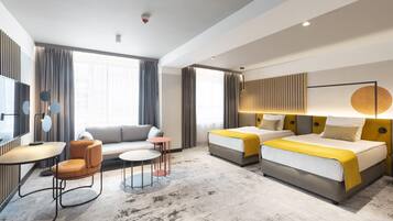 Habitación Premium, 2 camas individuales | Ropa de cama hipoalergénica y caja de seguridad en la habitación