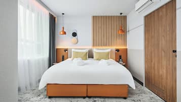 Suite, 1 King-Bett | Allergikerbettwaren, Zimmersafe, Schreibtisch