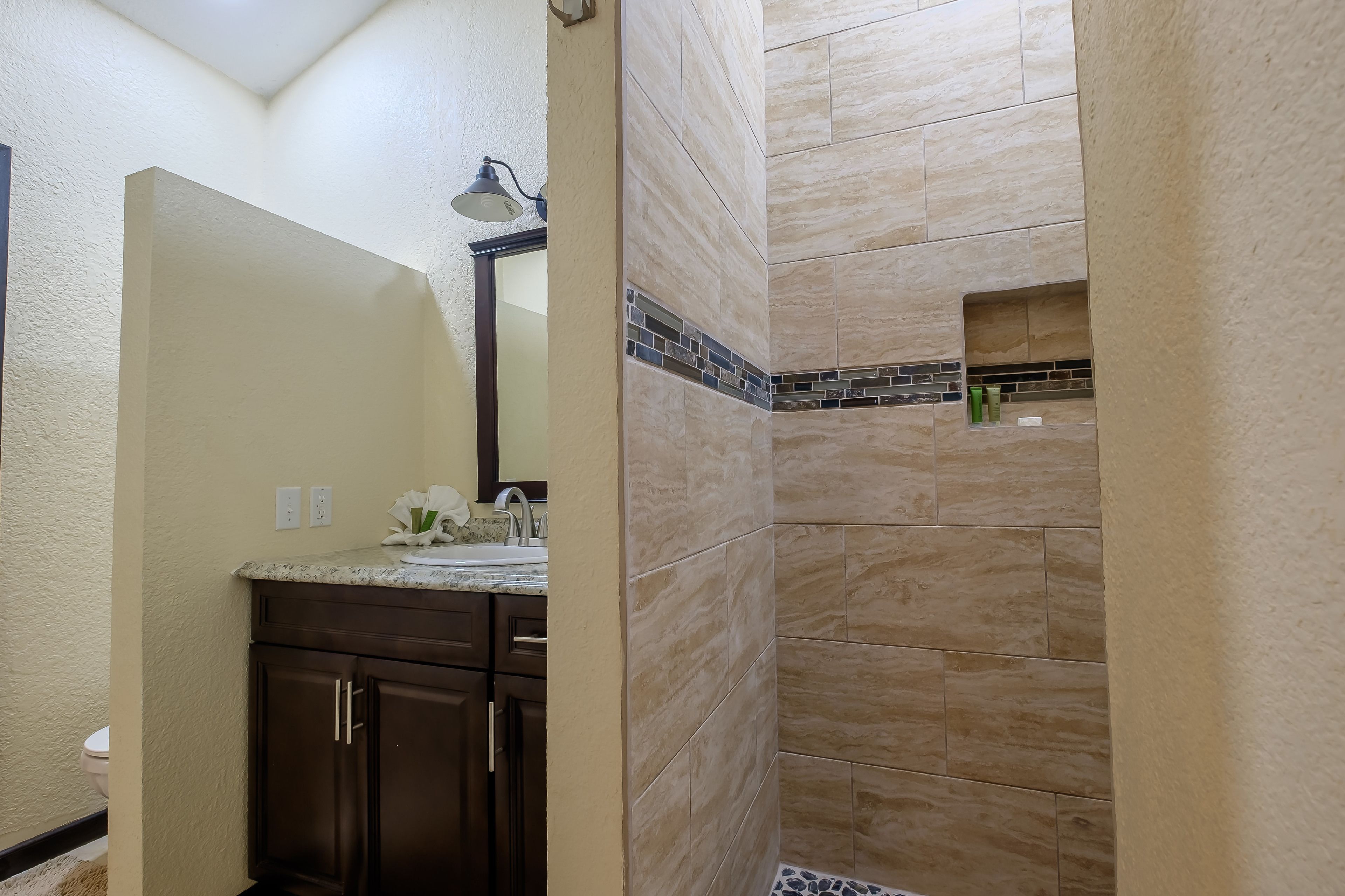 shower, free toiletries, hair dryer, towels