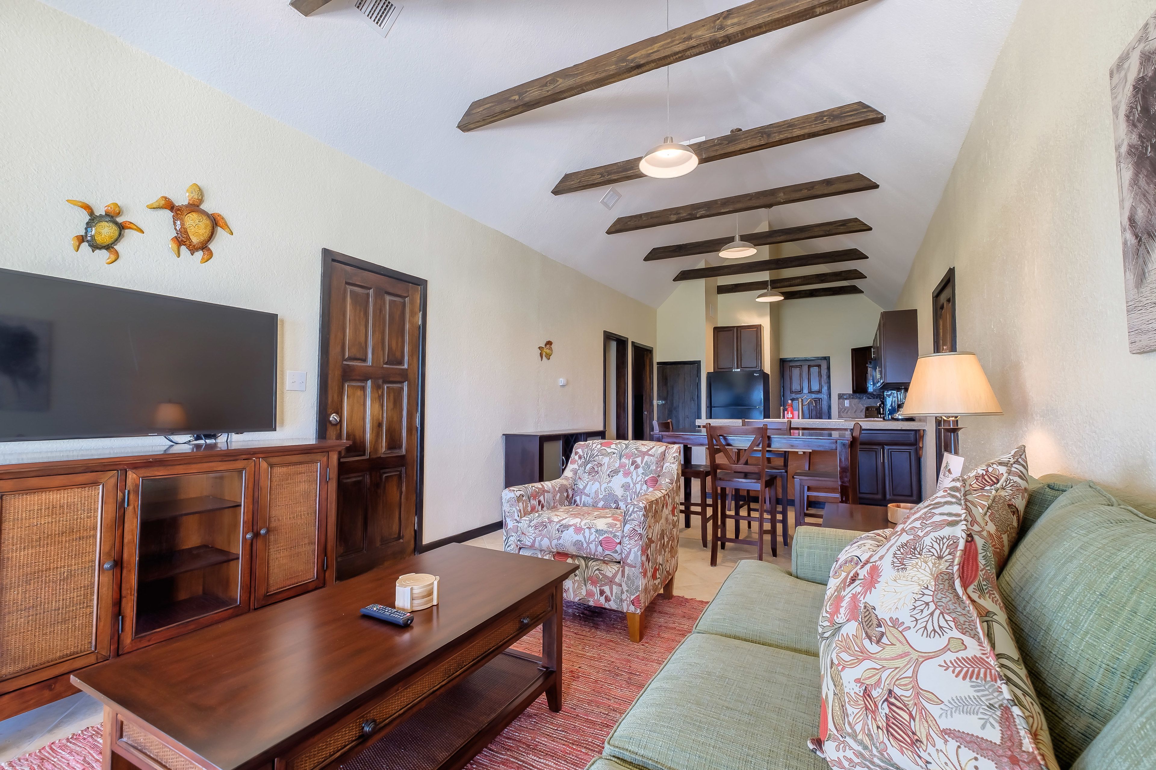 superior penthouse, 1 bedroom, kitchen, oceanfront | living area | flat-screen tv