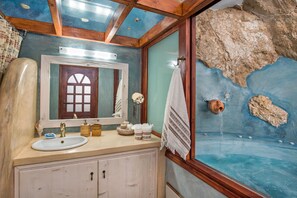 Deluxe Villa, 1 Bedroom, Hot Tub | Bathroom | Shower, jetted tub, free toiletries, hair dryer