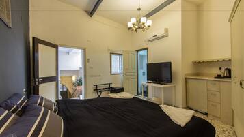 Double Room | Desk, blackout curtains, iron/ironing board, free cots/infant beds