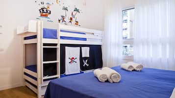 Basic Quadruple Room, Shared Bathroom | Desk, laptop workspace, blackout drapes, free WiFi