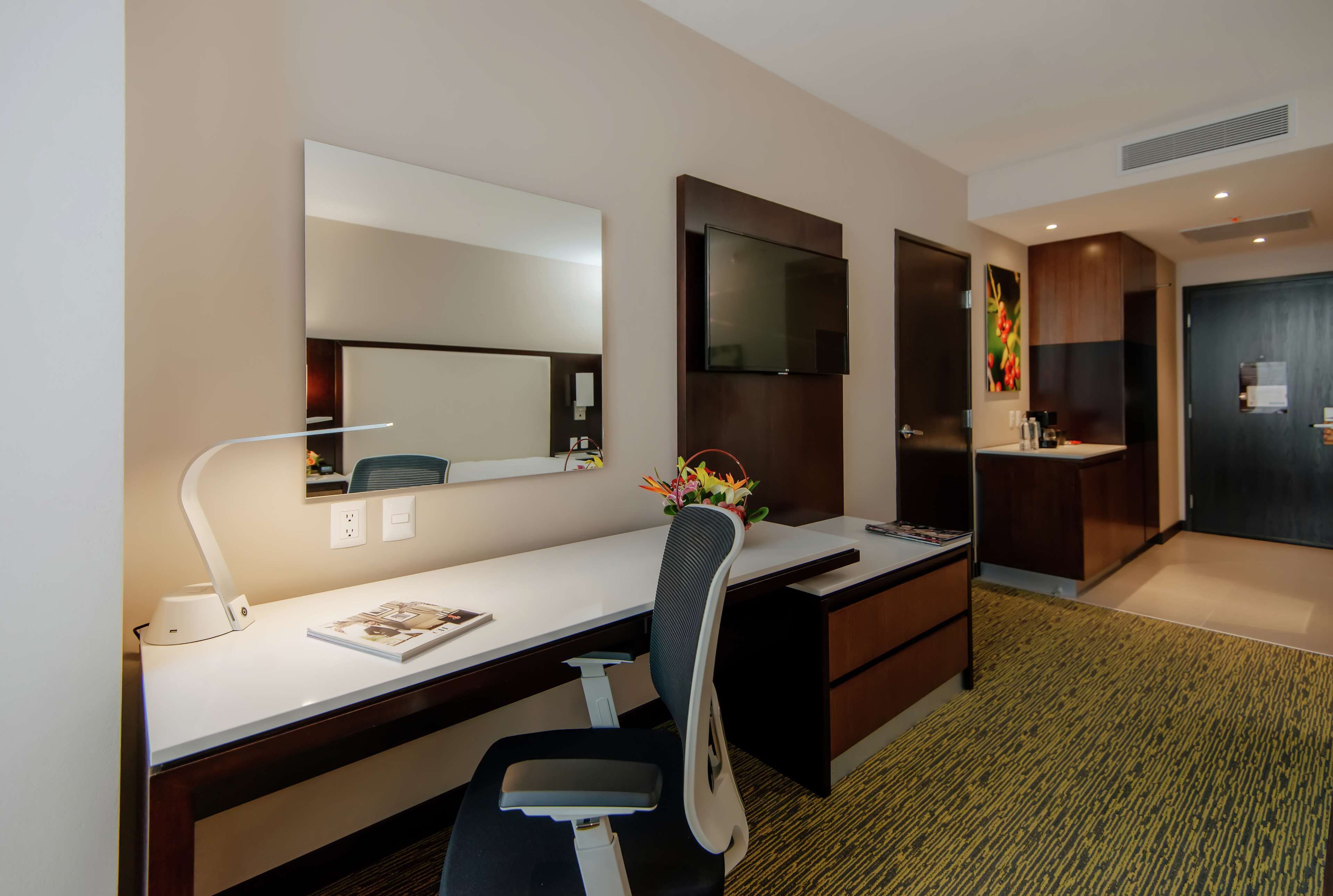 premium bedding, in-room safe, blackout curtains, free wifi