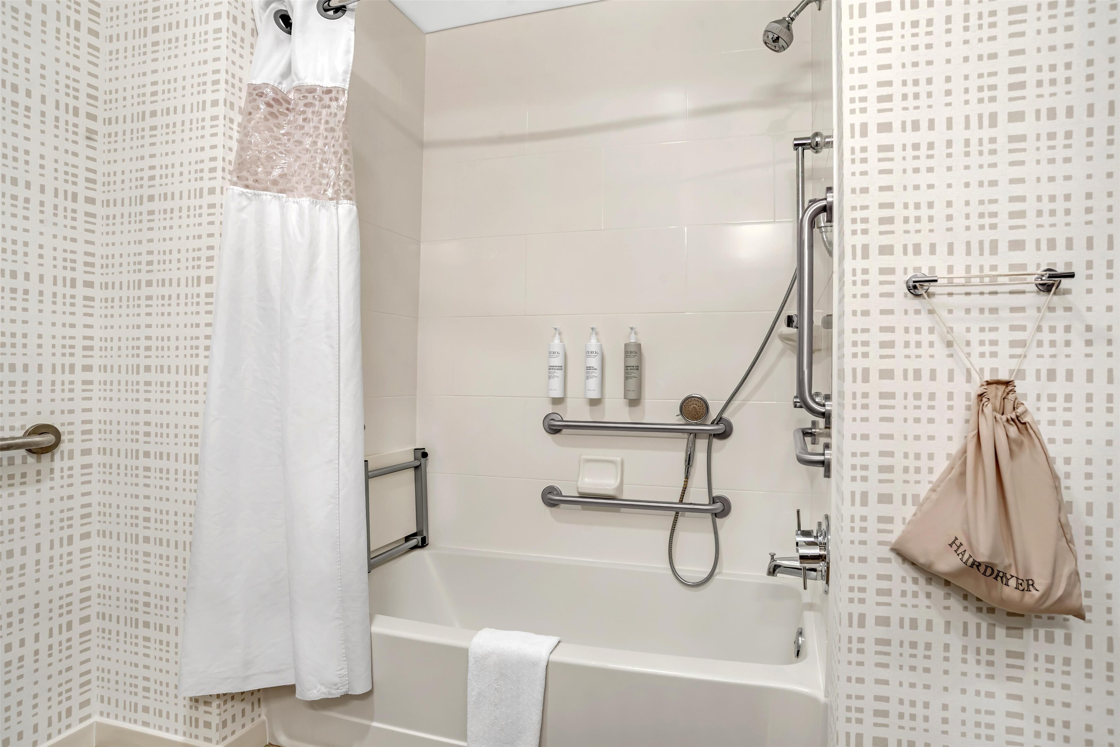 combined shower/bathtub, free toiletries, hair dryer, towels