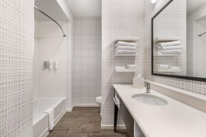 Room, 1 King Bed, Non Smoking, Refrigerator | Bathroom | Combined shower/tub, free toiletries, hair dryer, towels