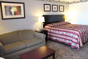 Suite, 1 King Bed | Desk, blackout curtains, iron/ironing board, free WiFi