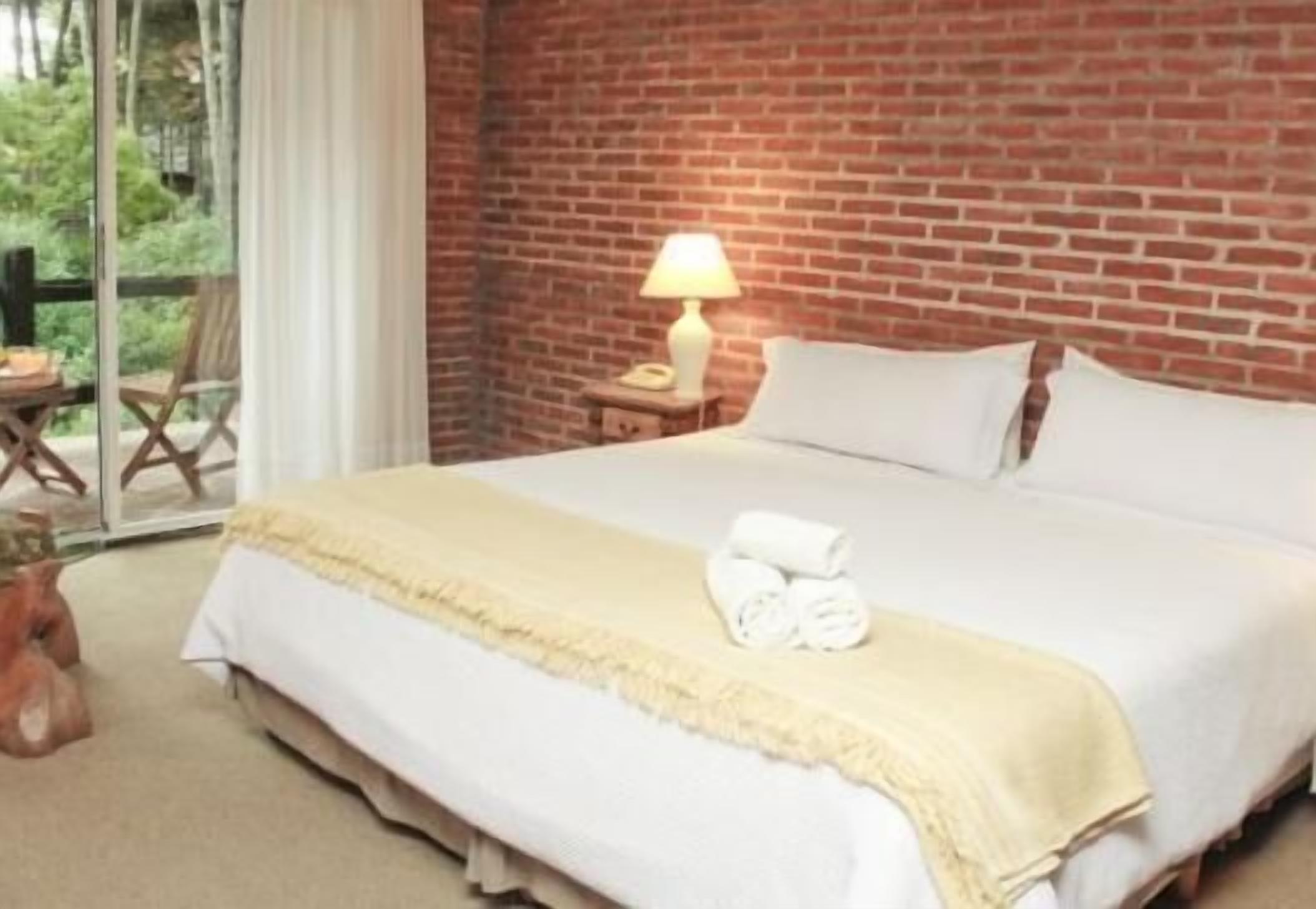 Premium bedding, down comforters, pillowtop beds, in-room safe