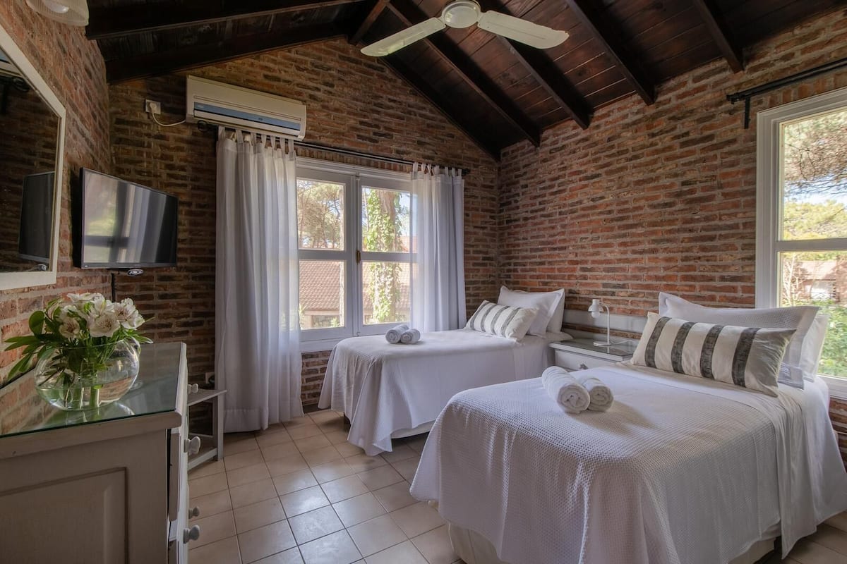Premium bedding, down comforters, pillowtop beds, in-room safe