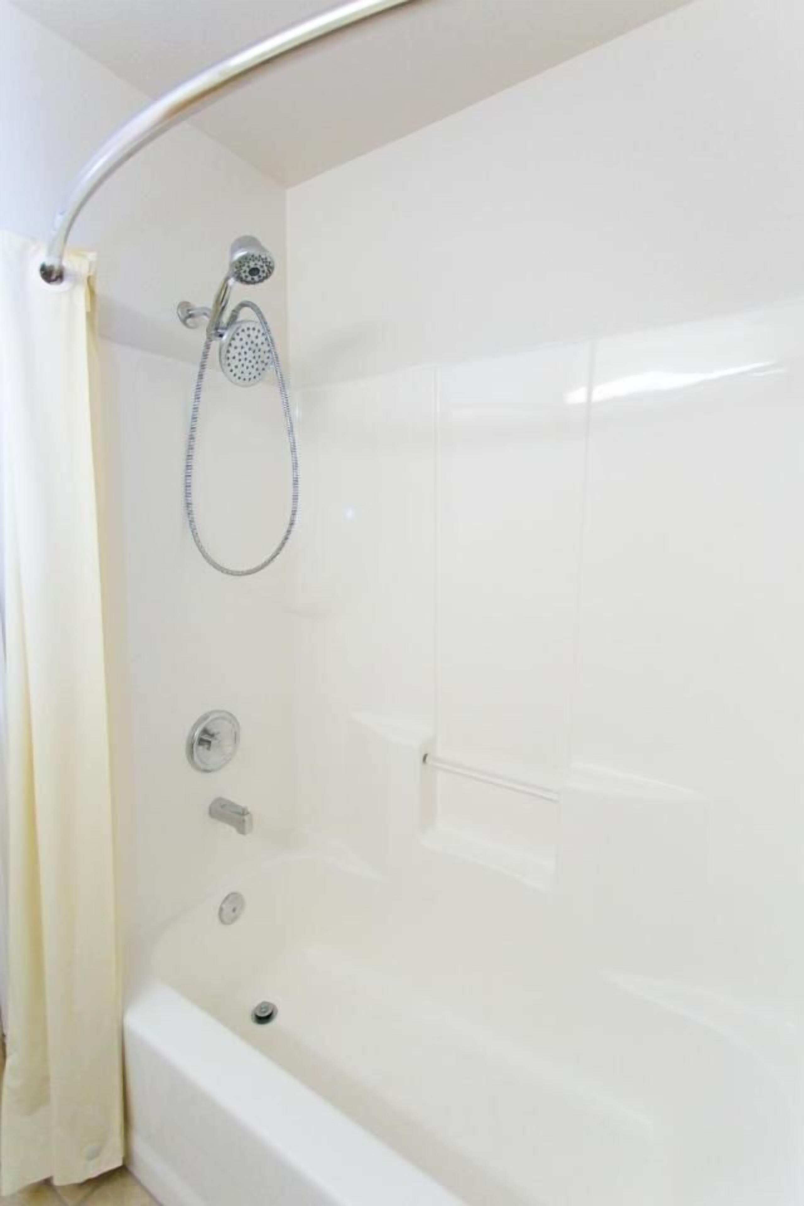 combined shower/bathtub, deep-soaking bathtub, rainfall showerhead