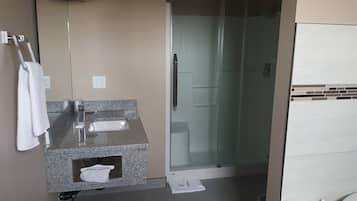Suite, Non Smoking, Jetted Tub | Bathroom | Free toiletries, towels