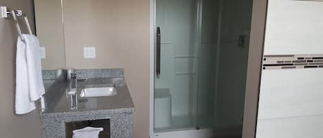 Suite, Non Smoking, Jetted Tub | Bathroom | Free toiletries, towels