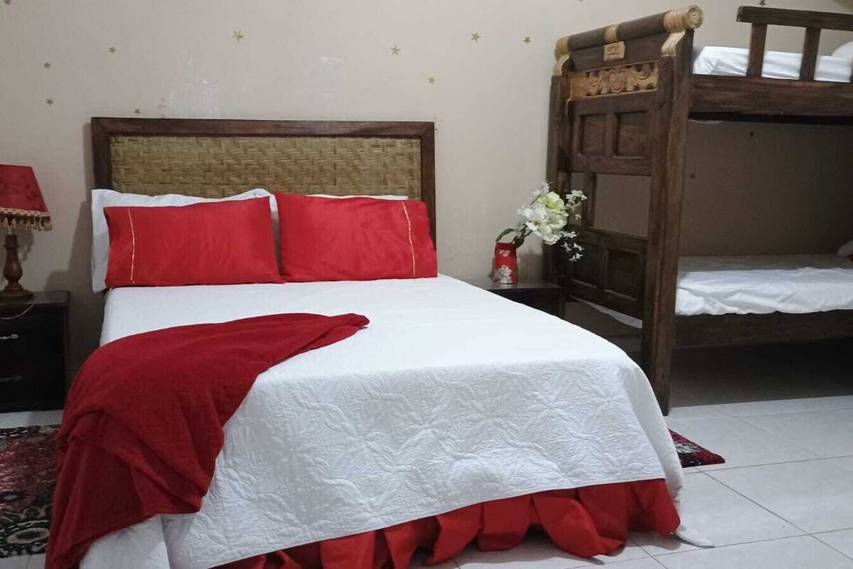 Premium bedding, desk, laptop workspace, iron/ironing board (on request)