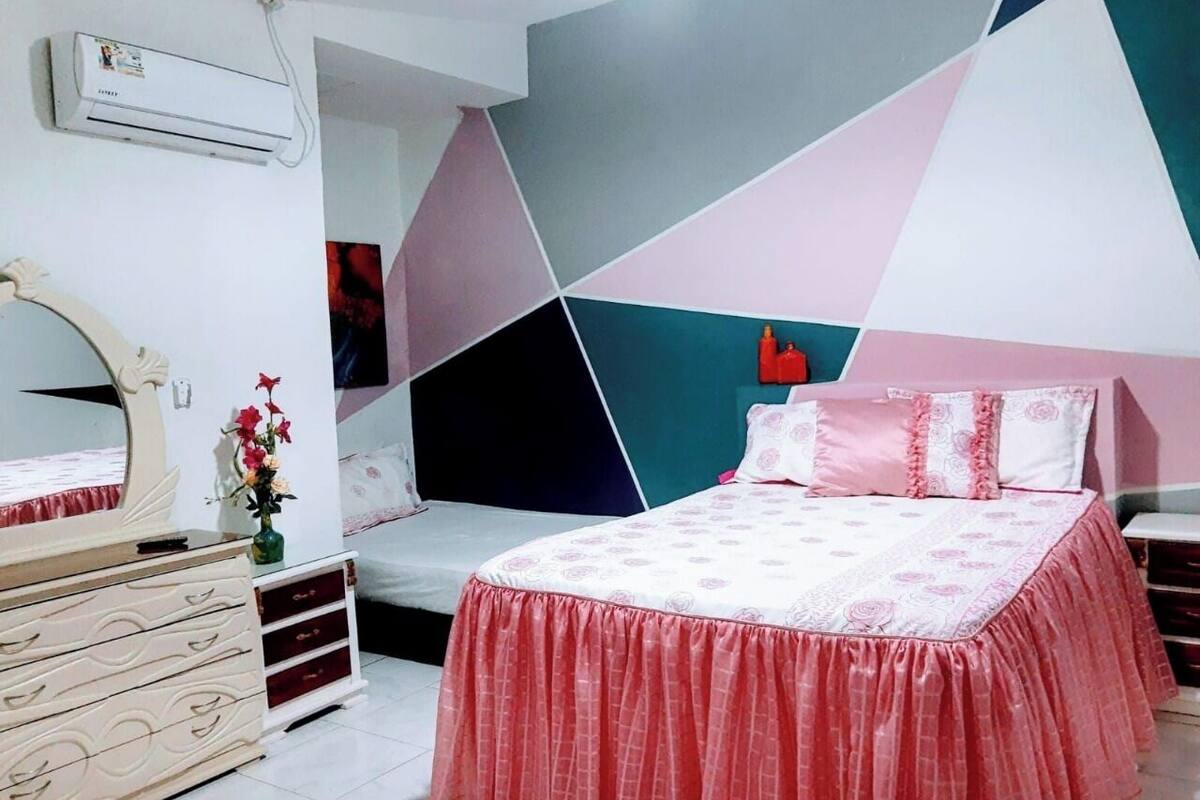 Economy Triple Room, Garden View | Terrace/patio