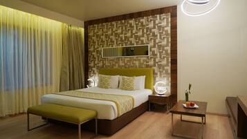 Nirvana Executive Room | Premium bedding, in-room safe, desk, laptop workspace