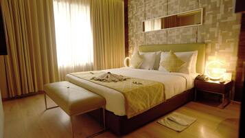 Nirvana Executive Room | Premium bedding, in-room safe, desk, laptop workspace