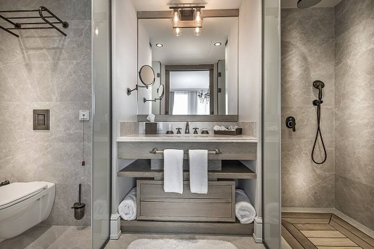 shower, hydromassage showerhead, designer toiletries, hair dryer