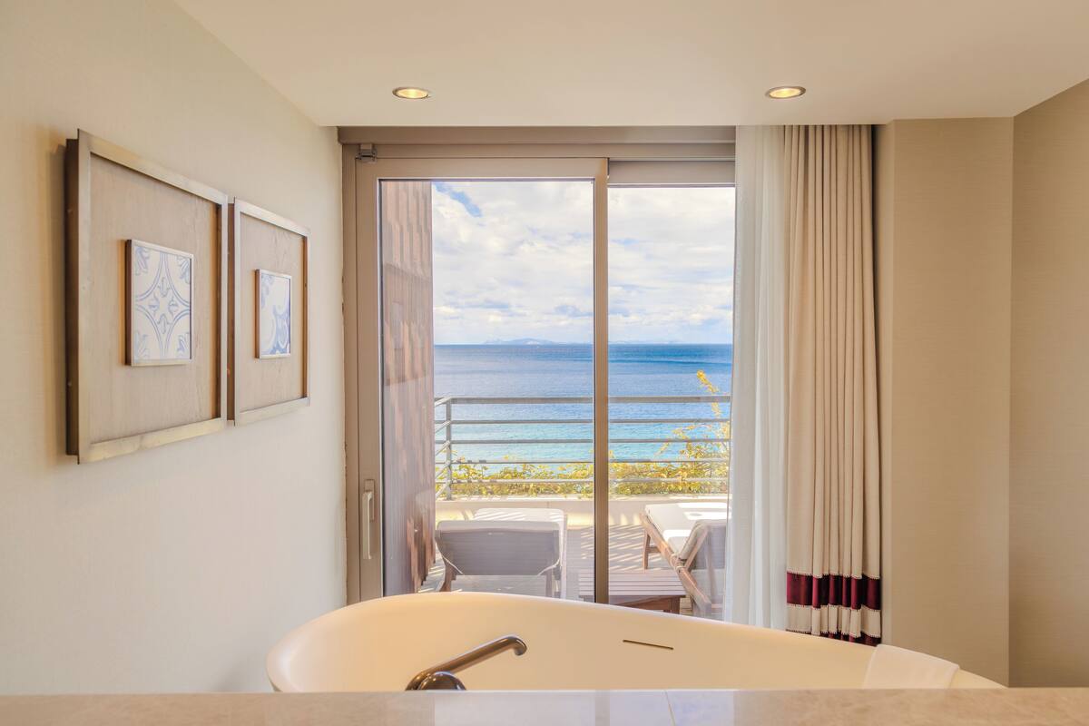 deluxe balcony seaview room | premium bedding, memory-foam beds, in-room safe, blackout curtains