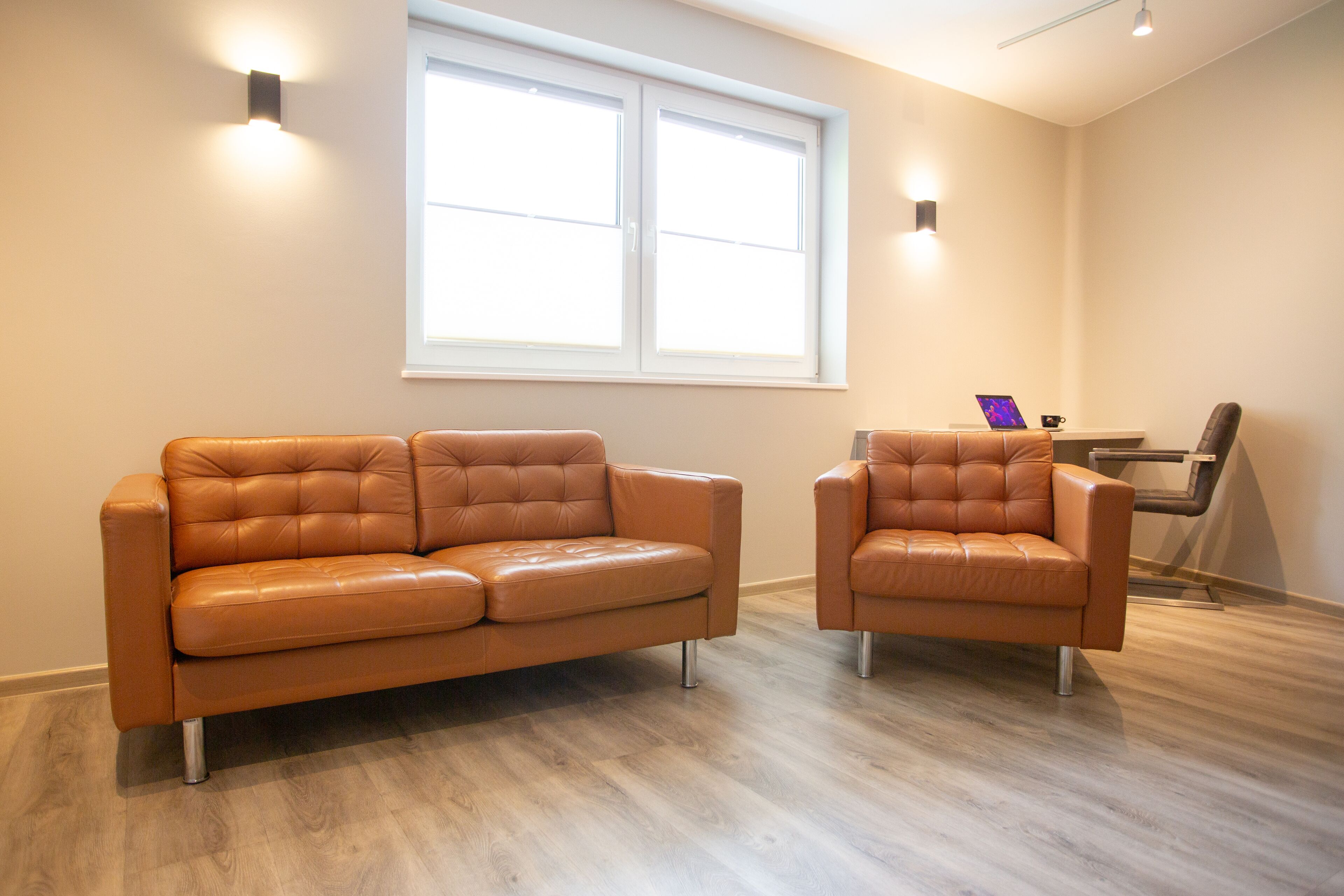 deluxe apartment | living area | 40-inch flat-screen tv with satellite channels, tv, netflix