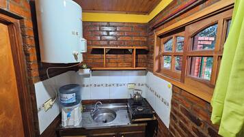 Classic Cabin | Private kitchenette | Full-sized fridge, oven, cookware/dishes/utensils, paper towels