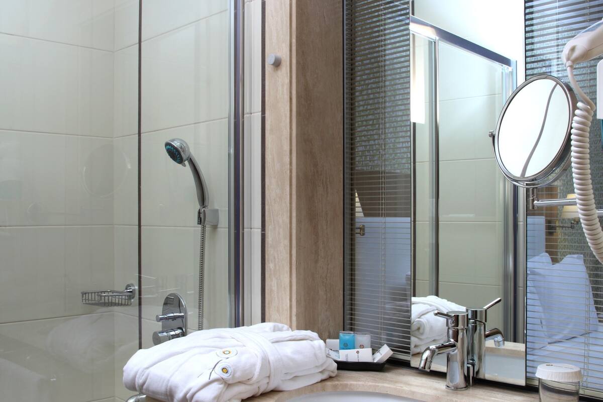 shower, free toiletries, hair dryer, bathrobes