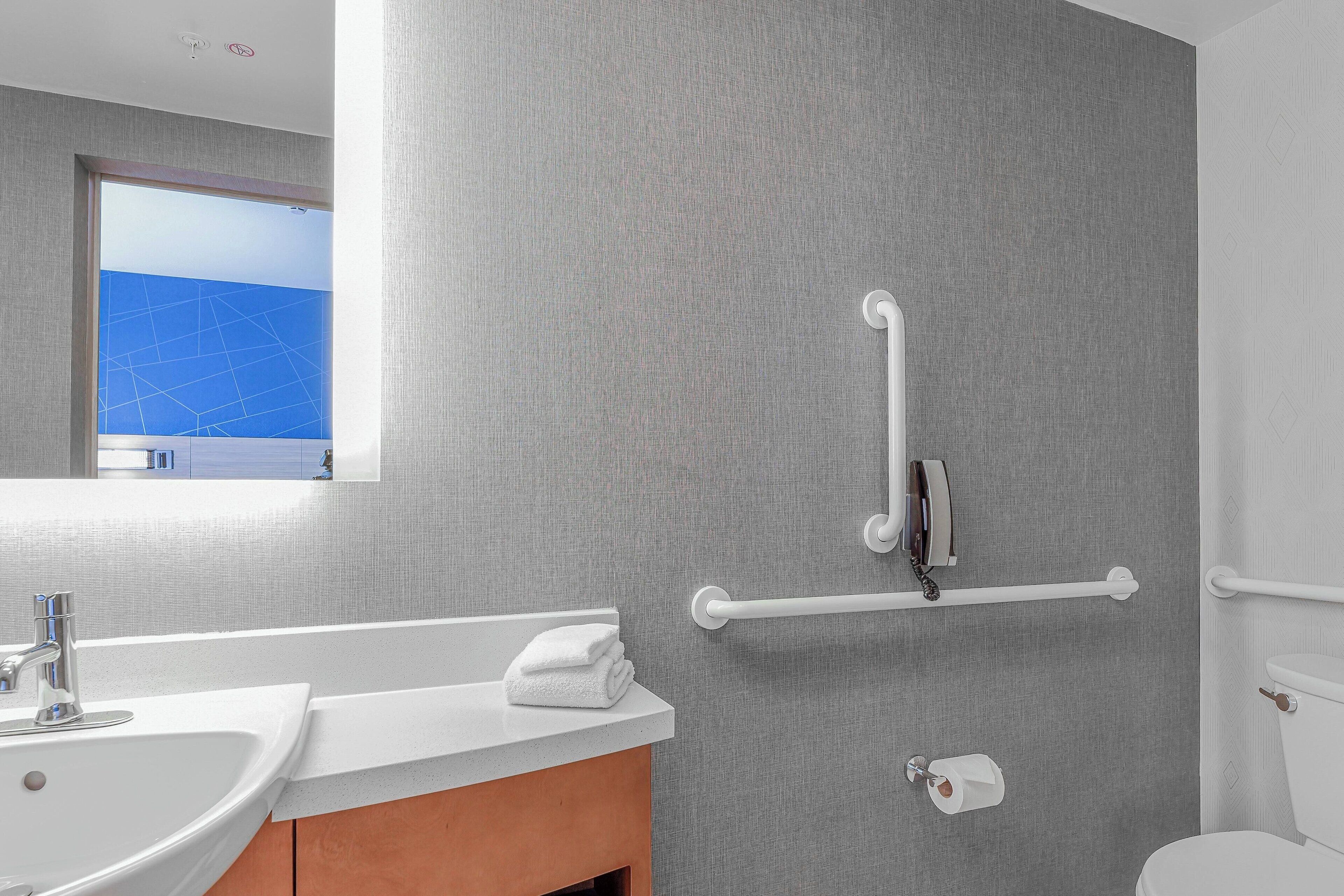 combined shower/bathtub, free toiletries, hair dryer, towels