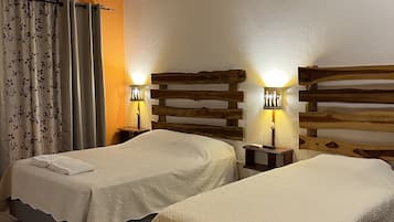 Ropa de cama de alta calidad y minibar