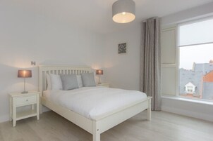 Premium bedding, iron/ironing board, free cribs/infant beds, free WiFi