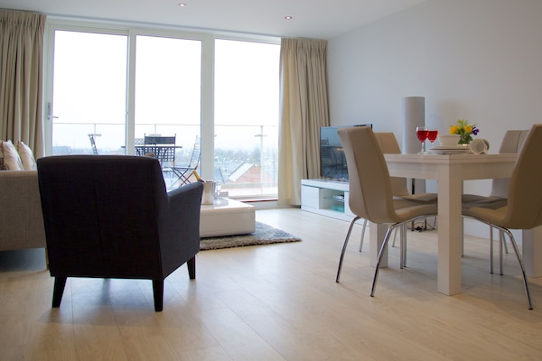 Apartment, 2 Bedrooms | Living area | Flat-screen TV, DVD player, iPod dock