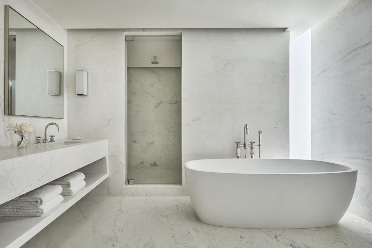 Designer toiletries, hair dryer, bathrobes, slippers
