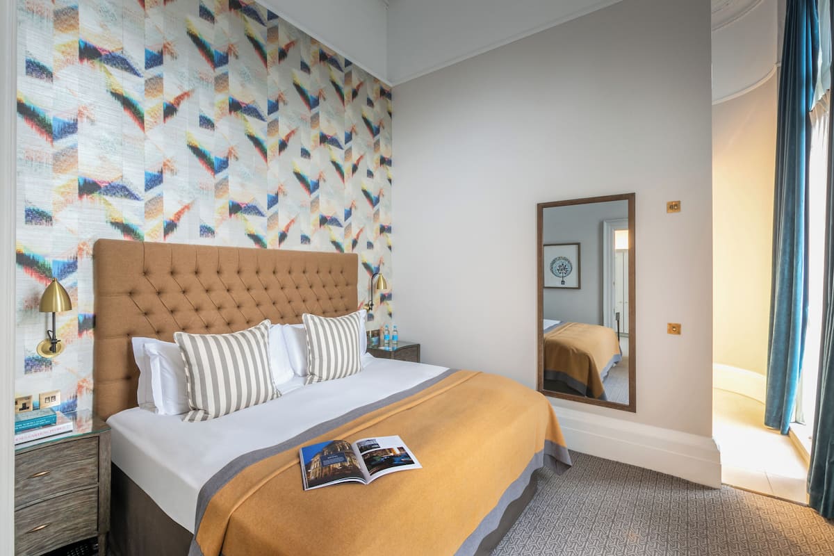 Deluxe Double Room | Minibar, in-room safe, desk, iron/ironing board