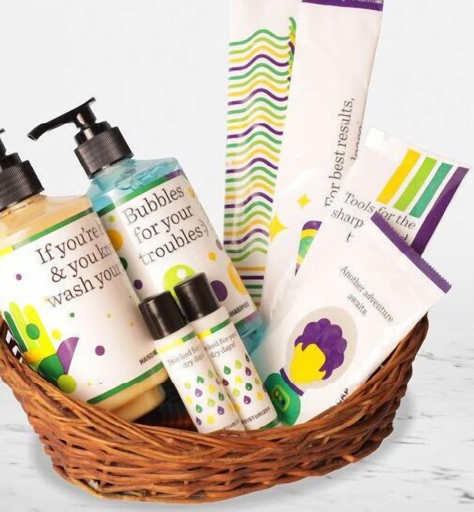 A basket containing various personal care products including shampoo, conditioner, and body wash.
