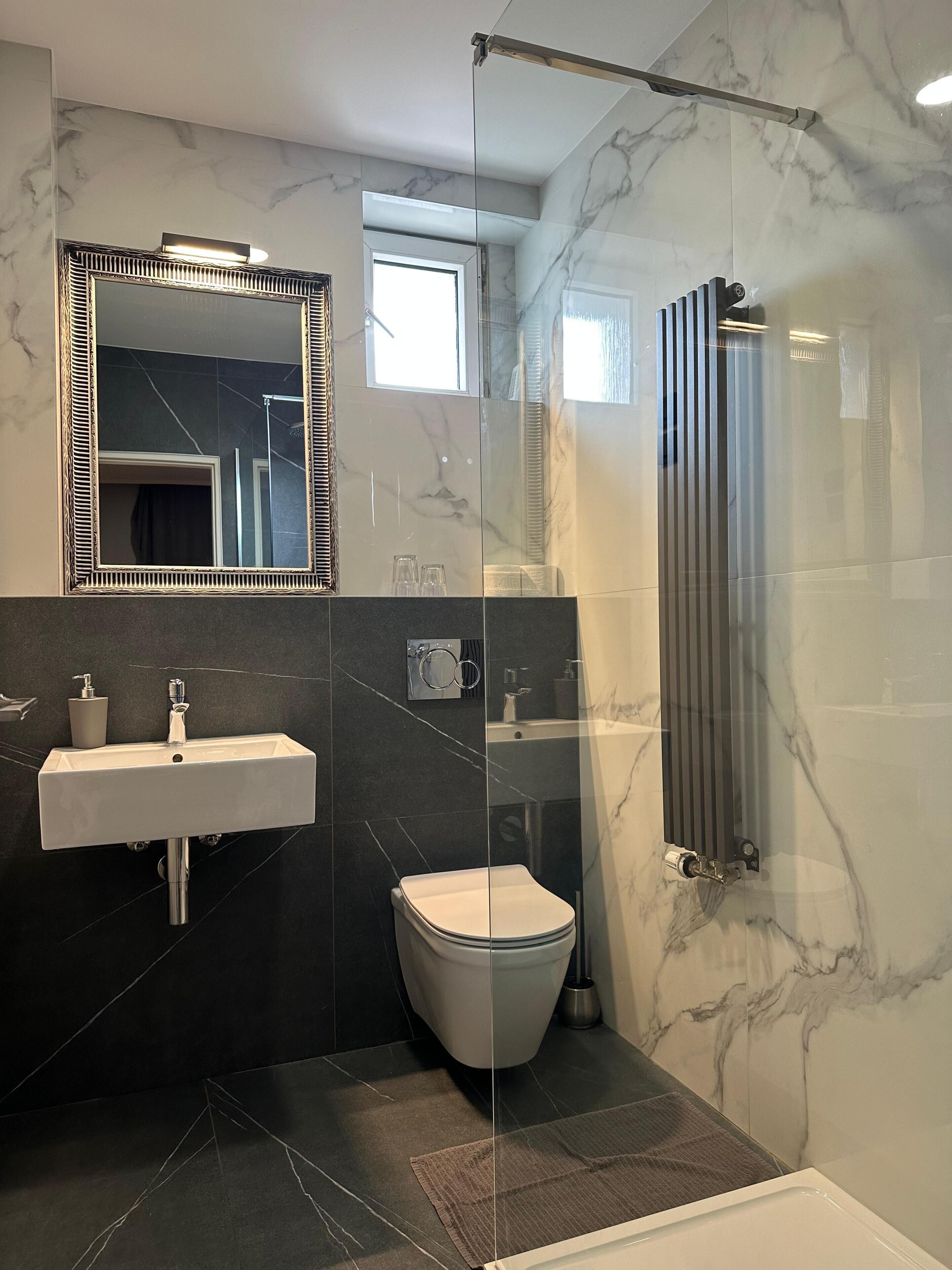 Shower, free toiletries, hair dryer