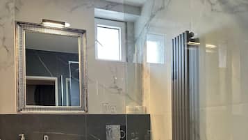 Shower, free toiletries, hair dryer