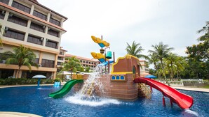 A water park with slides and a pool. - Amverton Heritage Resort (Malacca City)