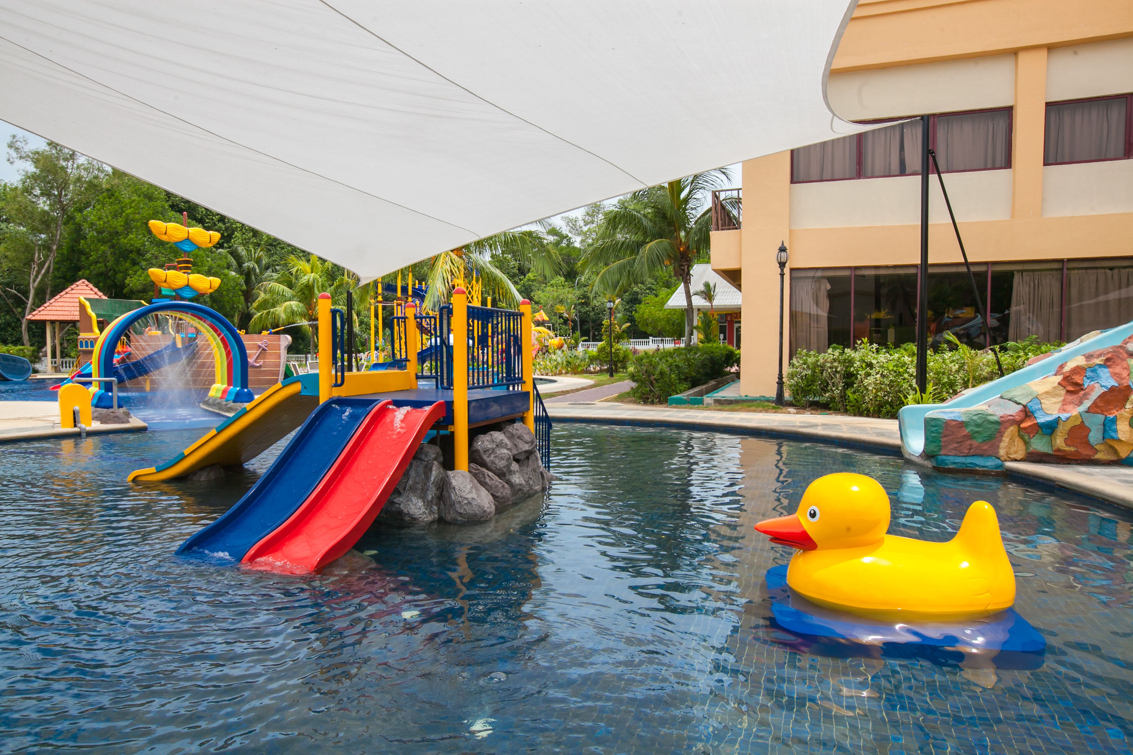 A water park with slides and a duck float.