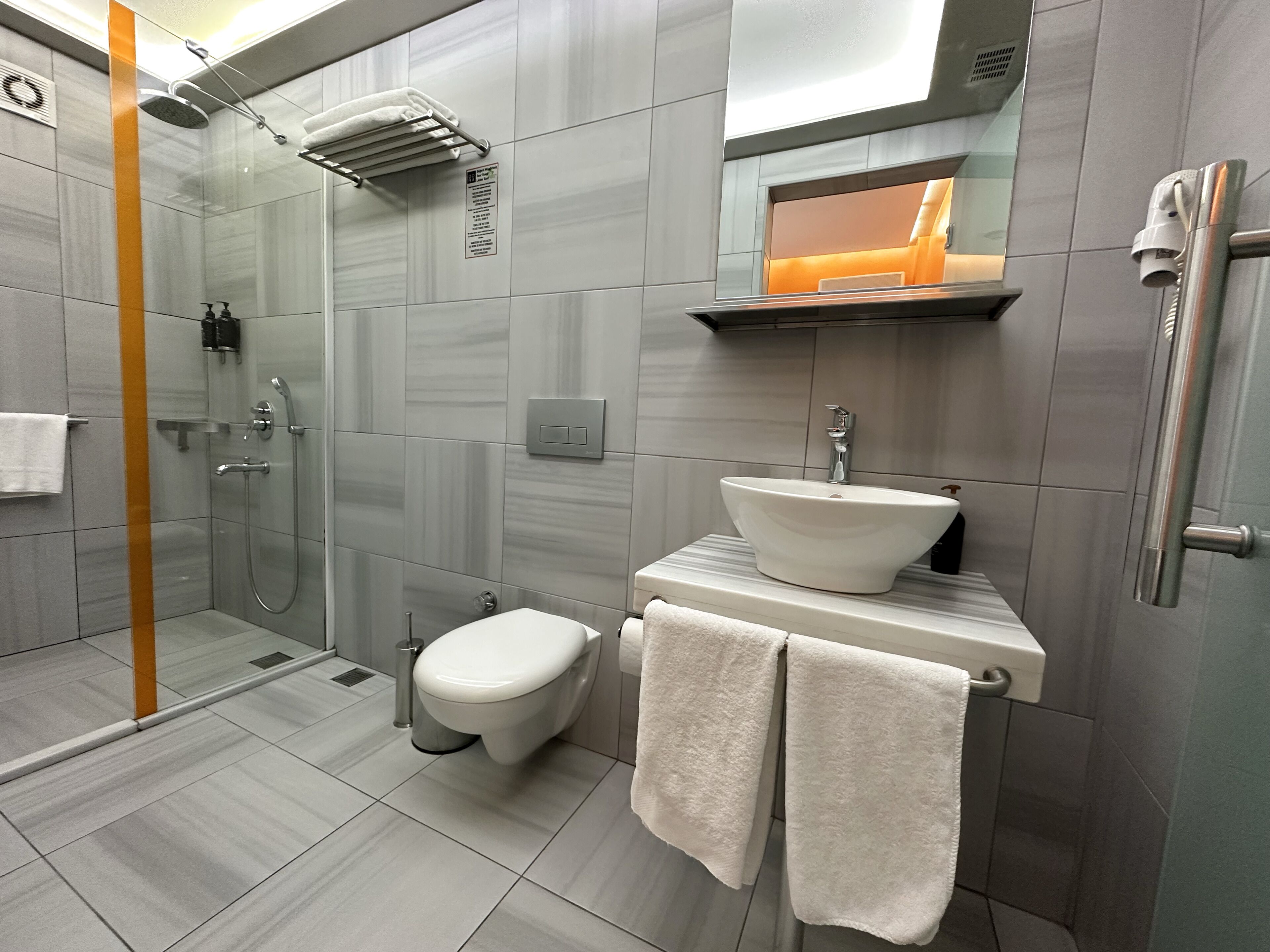 standard double or twin room | bathroom | hair dryer, slippers, towels, soap