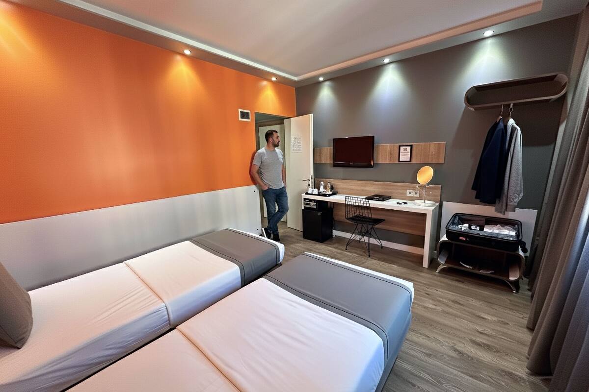 Quarto duplo standard, 2 camas de solteiro | 2 quartos, roupas de cama premium, frigobar, cofres nos quartos