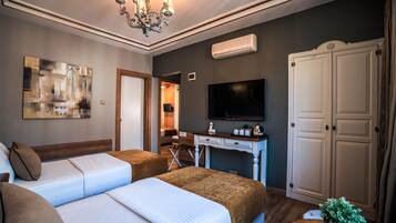 Suite, 2 habitaciones | Ropa de cama de alta calidad y minibar