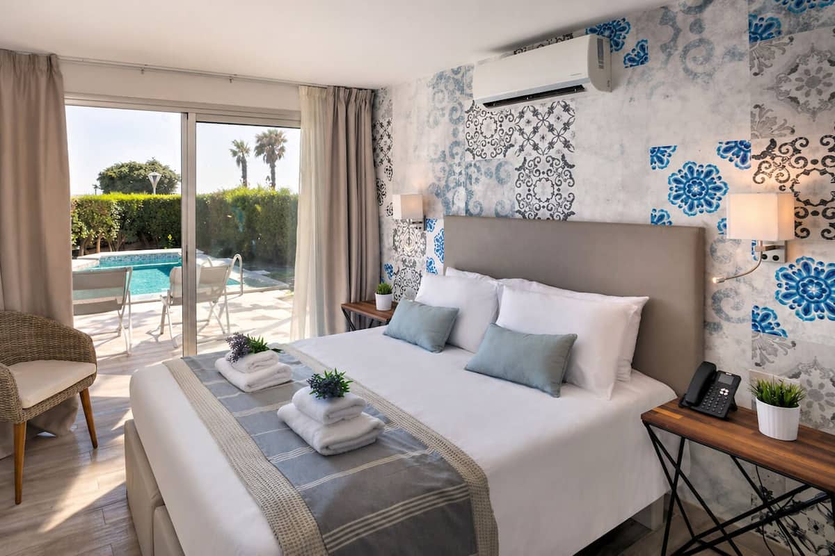 Suite Deluxe, alberca privada, en el área del jardín | 1 habitación, minibar, caja de seguridad en la habitación y escritorio