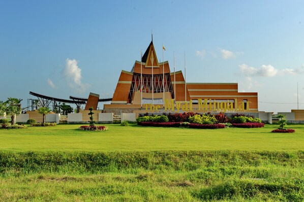 A modern building with a distinctive triangular roof and a large sign reading "The Myal Ngalar."