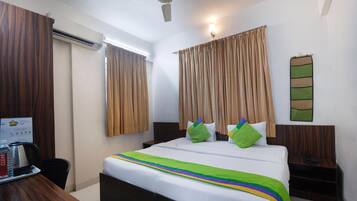 Economy Room | Desk, iron/ironing board