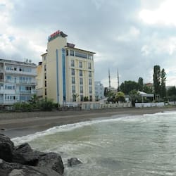 On the beach, sun-loungers, beach umbrellas