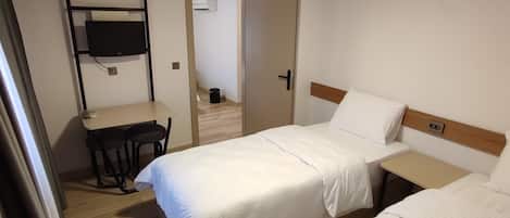 Family Room | Egyptian cotton sheets, premium bedding, in-room safe, desk