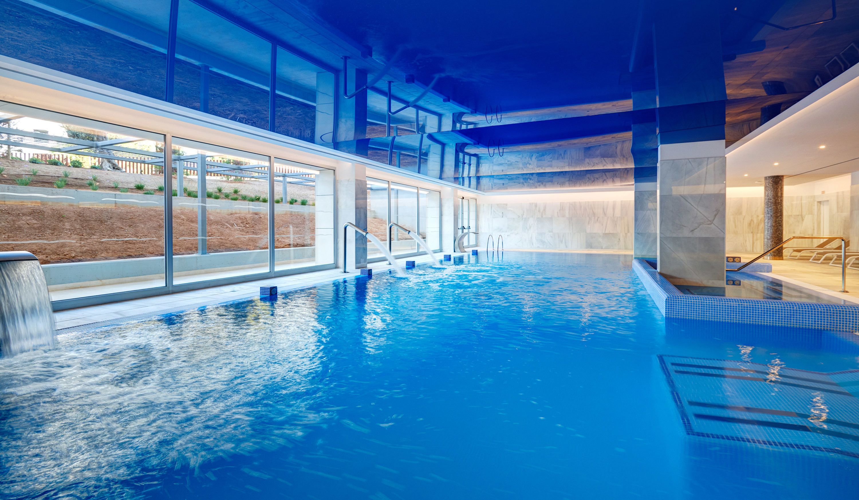 indoor pool, outdoor pool, open 9:30 am to 7:00 pm, pool umbrellas