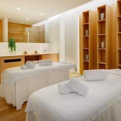 Sauna, hot tub, body treatments, hot stone massages, sports massages