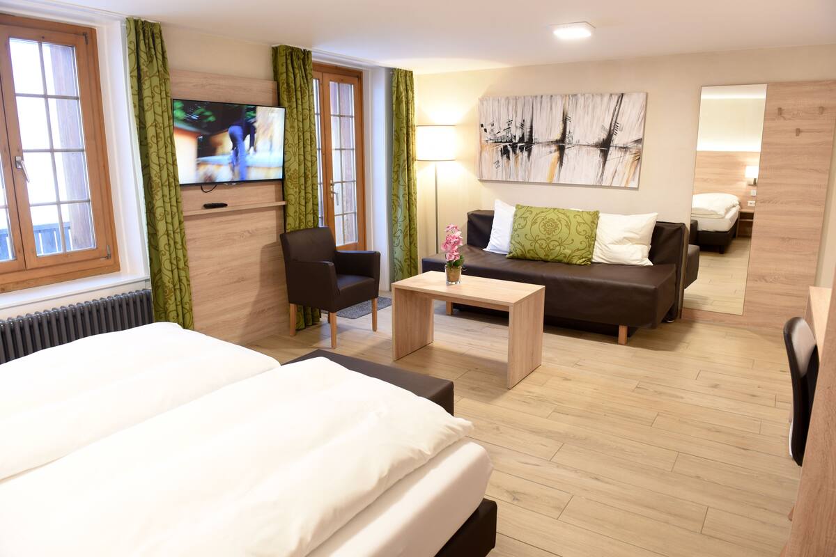 Premium bedding, blackout curtains, soundproofing, iron/ironing board