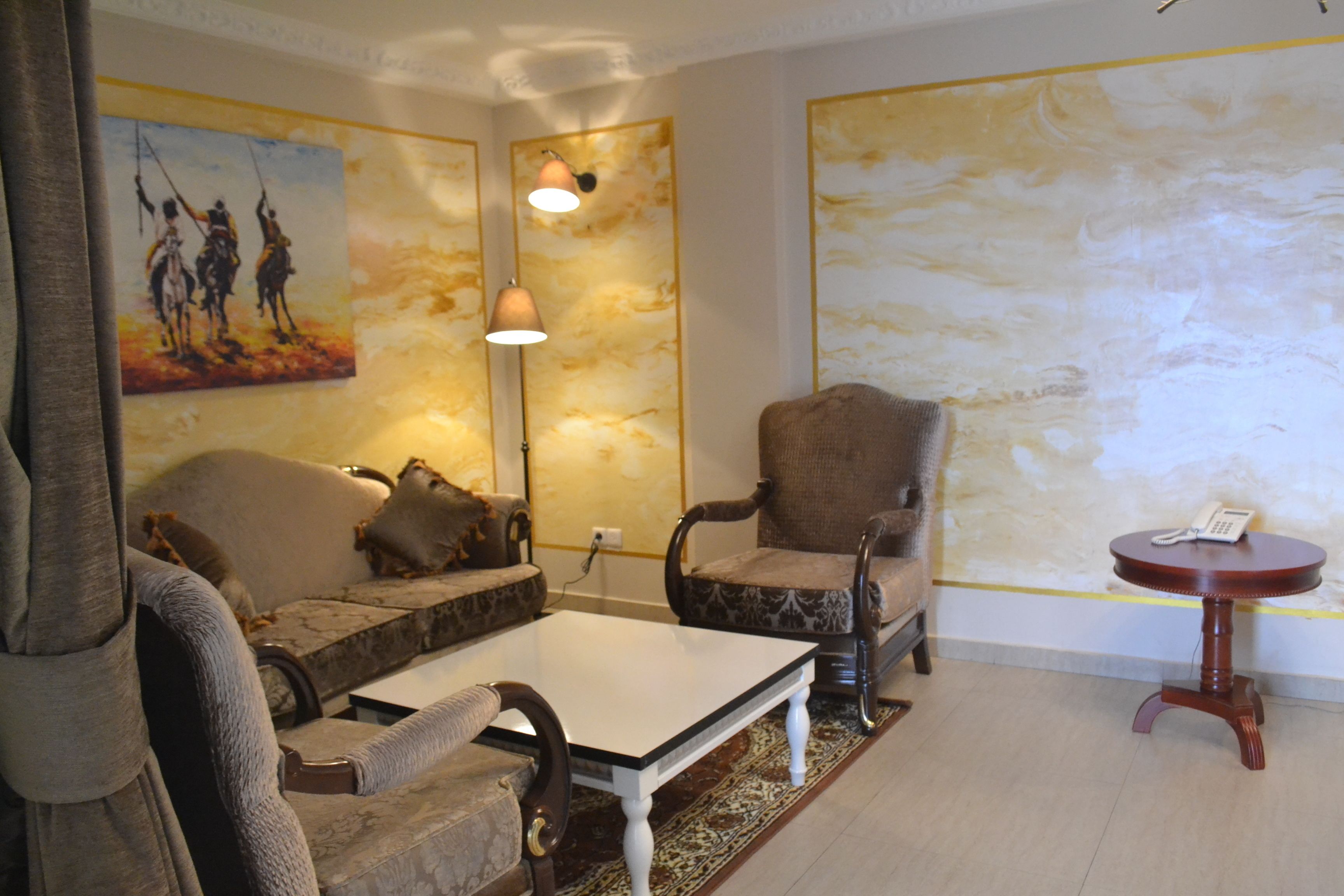 suite | living room | flat-screen tv