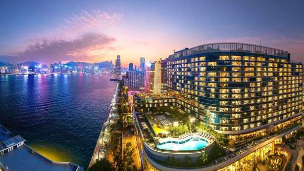 A modern hotel with a pool, located by a waterfront. - Kerry Hotel Hong Kong by Shangri-la (Kowloon)
