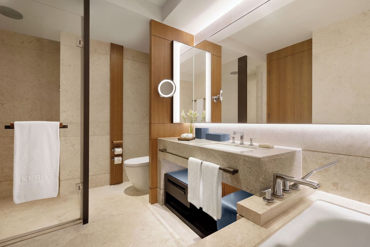 hair dryer, bathrobes, slippers, towels